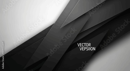 Abstract dark gray and white geometric background with sharp angles and shadows.