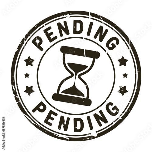 A circular pending stamp featuring an hourglass and star motifs