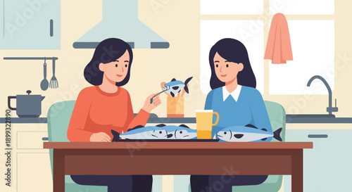 Two women in a kitchen preparing and eating fish at a table