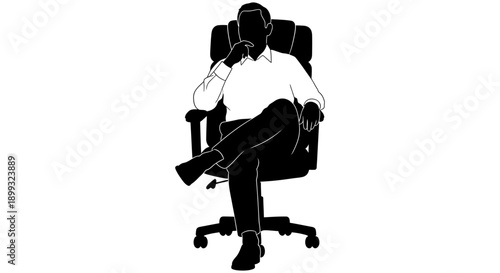 Businessman sitting in office chair with phone to ear looking relaxed