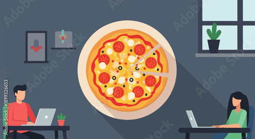 Two people working on laptops with a pizza on a table