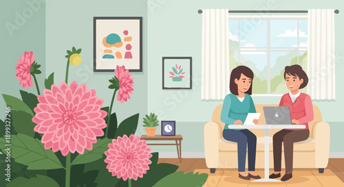 Two women collaborate on a laptop, surrounded by blooming dahlias in a cozy room