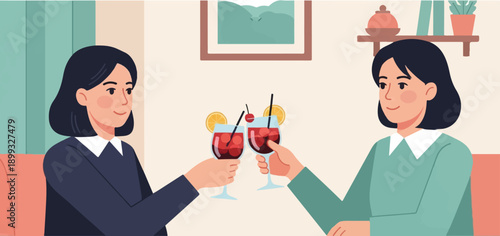 Two women clinking glasses with cocktails in a room