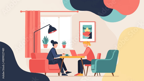 Two women collaborate at a table, one with a laptop and coffee