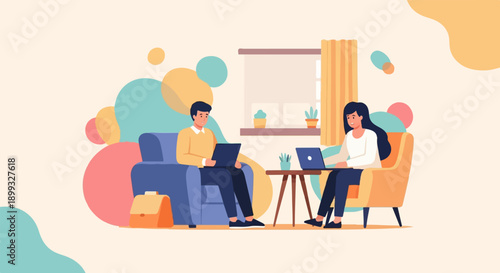 Two people working on laptops in a living room with colorful abstract shapes