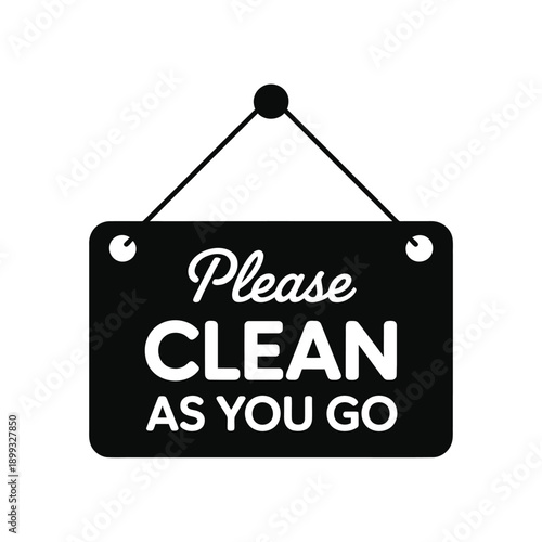 A black sign displays the message please clean as you go in white
