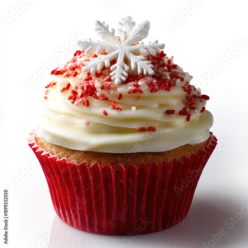 Delicious red-wrapped cupcake with white frosting and snowflake topping, isolated on transparent background
