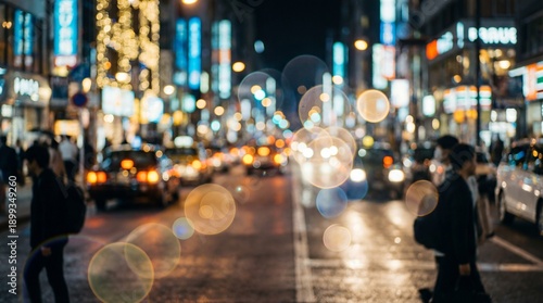 A bustling city street illuminated by vibrant lights and neon signs at night.