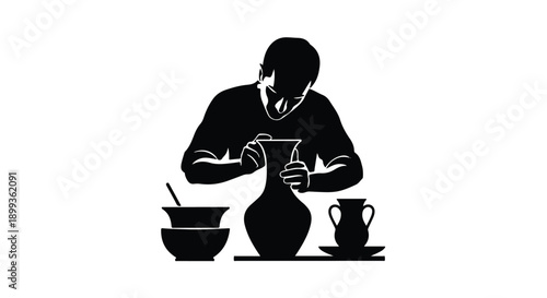 Craftsman shaping clay on a pottery wheel, creating art with focused dedication