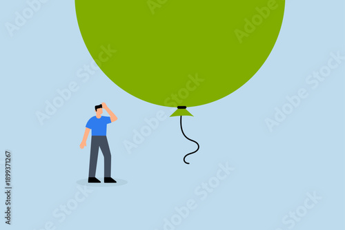 Stock market, scared businessman investor standing under huge big balloon bubble.