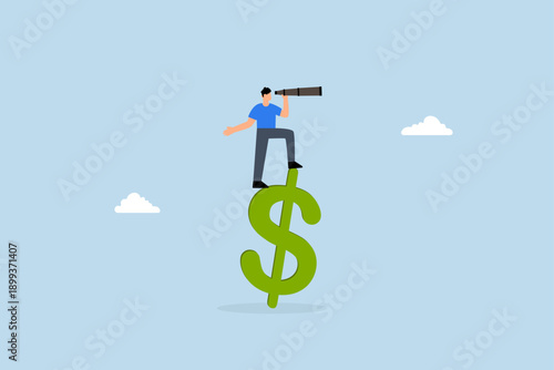 Vision for global economy, a businessman stands on US dollar money with a telescope to see the future forecast.