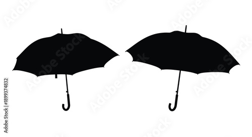 Two black umbrellas against a white background a striking silhouette