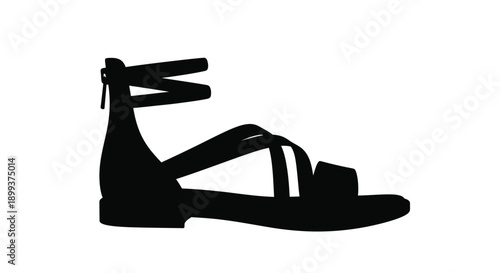 Black sandal with delicate straps a striking silhouette