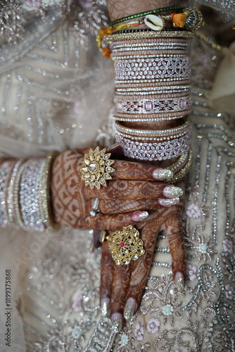 Indian bride's hands adorned with henna.