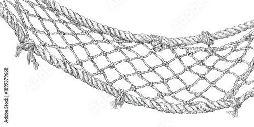 A grayscale close-up of a rope net, intricately woven with knots and thick cording against black