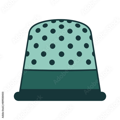 Green thimble with black polka dots on a white background