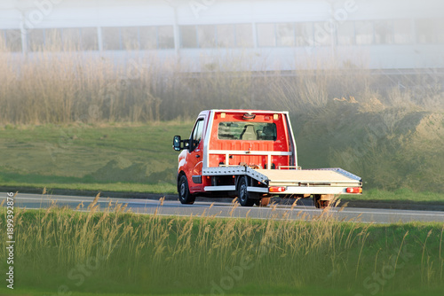 Wallpaper Mural Emergency towing service truck on country road Torontodigital.ca