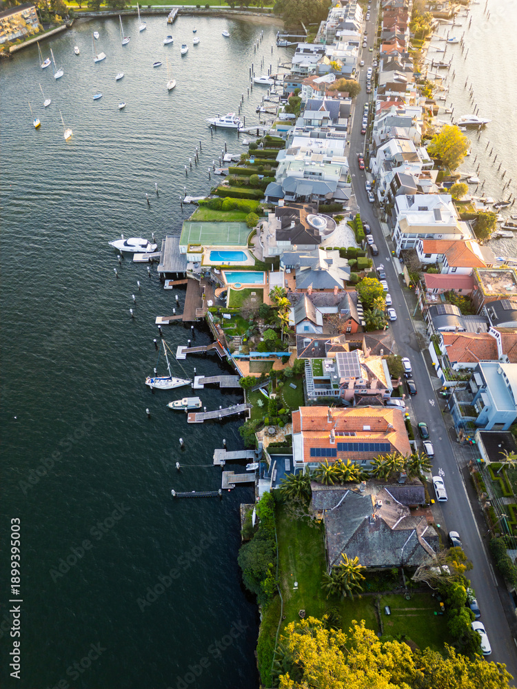 Fototapeta premium Sydney, Australia: Aerial view of the Birchgrove affluent suburb with properties with their own yacht pier in Sydney in Australia