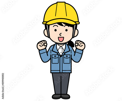 ガッツポーズするヘルメットをかぶった現場監督の女性