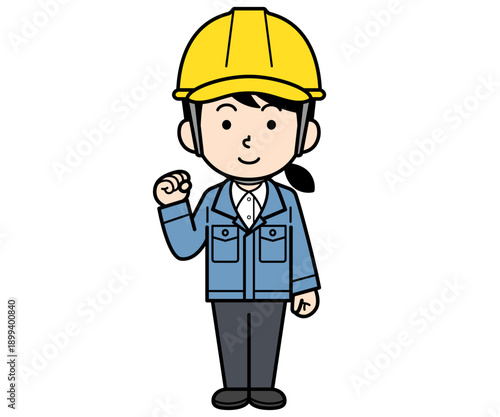 ガッツポーズするヘルメットをかぶった現場監督の女性