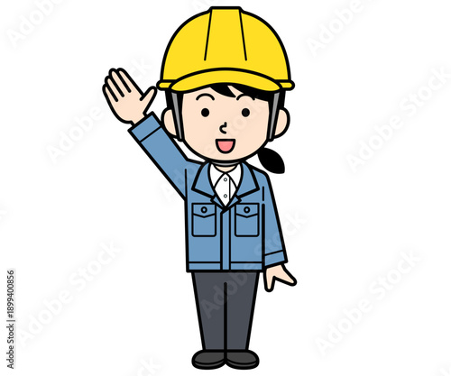 手を上げるヘルメットをかぶった現場監督の女性