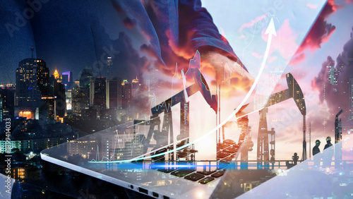 Double exposure of businessman with refinery plant and Crude Oil pump oil rig energy industrial machine for petroleum background	
