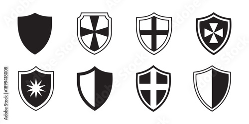 Black and White Vector Shield Icons Collection for Security, Protection, Defense, and Emblematic Design.
