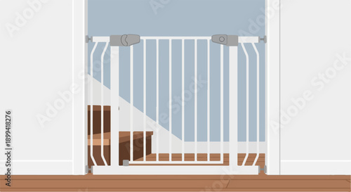White safety gate installed at the bottom of wooden stairs