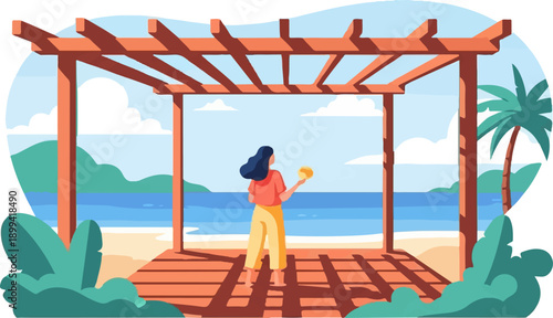 Woman on a wooden deck looks out at the ocean with a palm tree and hills