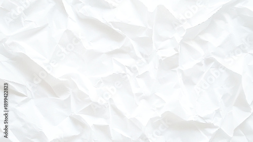 Blank white crumpled and creased paper poster texture background
