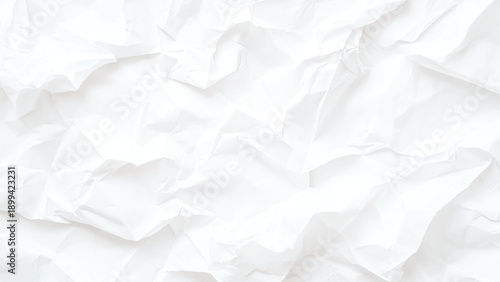 Blank white crumpled and creased paper poster texture background

