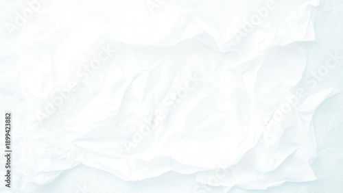 Blank white crumpled and creased paper poster texture background

