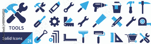 Collection of diverse tools and construction elements, including hammers, wrenches, drills, and measuring tapes for DIY and professional work