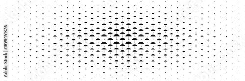 horizontal halftone of black umbrella spread from center for design and background.