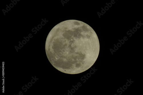 Full Moon with Visible Craters and Surface Details.