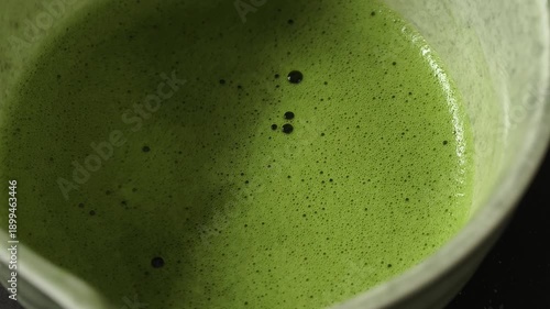 Wallpaper Mural Process making matcha green tea. Mixing matcha tea with whisk in wooden bowl. Healthy matcha drinks Torontodigital.ca