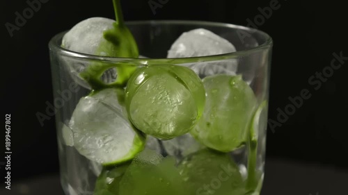 Wallpaper Mural Vibrant green matcha latte being poured into a glass Torontodigital.ca