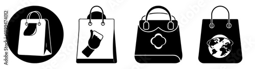 Set of four black and white shopping bags with modern designs and handles isolated on white background