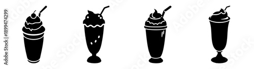Four stylish black and white milkshakes with whipped cream and cherries on gold stands isolated on white background