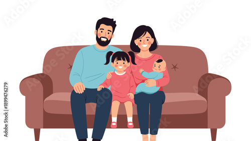 Happy young family with two children including a baby and daughter sitting together on a comfortable brown sofa against a white background.