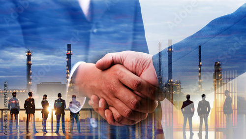 Double exposure of businessman handshake after agreement business deal and silhouette of business team with refinery plant background, cooperation partnership concept.