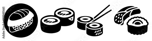 Fresh sushi rolls arrangement with chopsticks on black background minimalist flat lay top view