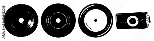 Set of four black vinyl records and retro camera isolated on white background minimalist concept
