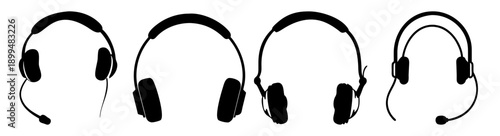 Set of four black wireless over-ear headphones isolated on white background for music and audio technology