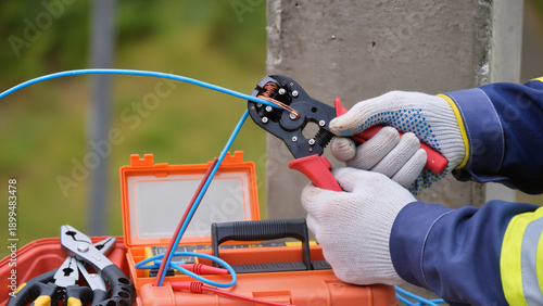 Photos electrician at work, Safe procedure,Gloves protect against electric shock,Electr