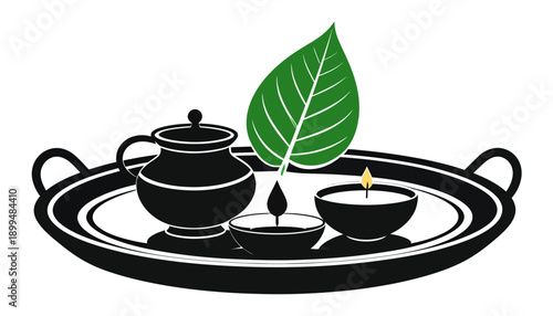 Traditional Indian Puja Tray with Diwali Diya and Leaf.