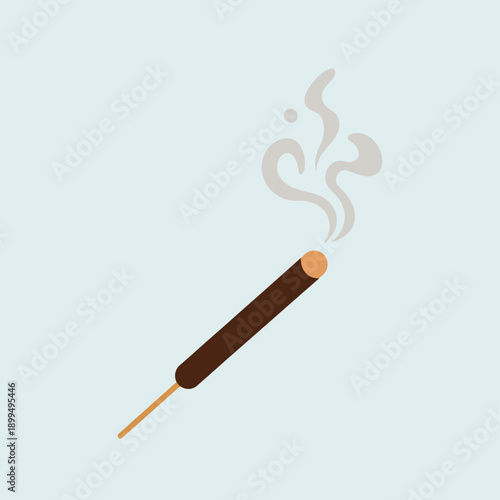 Cigar with smoke on stick.