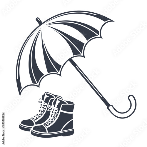 Elegant black umbrella paired with stylish boots against a plain background.