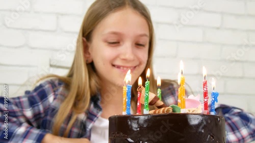Kid Birthday Party, Child Blowing Candles, Girl with a Cake as Gift for her Anniversary, Family, Children Celebration