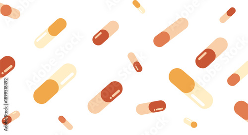 Colorful capsules scattered on white background for health and medicine concepts
